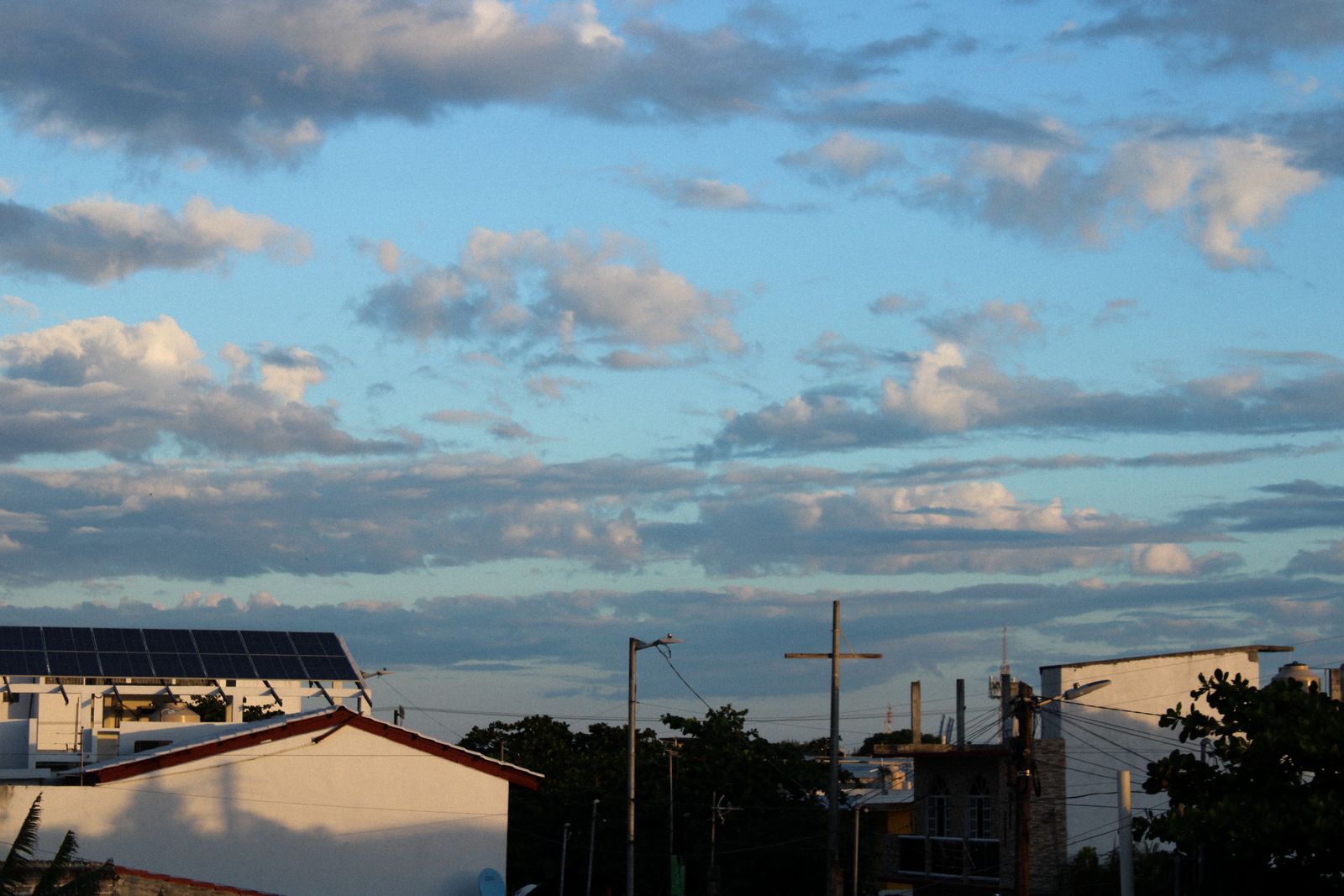 Rooftop solar array on a Triangle area home under an evening sky