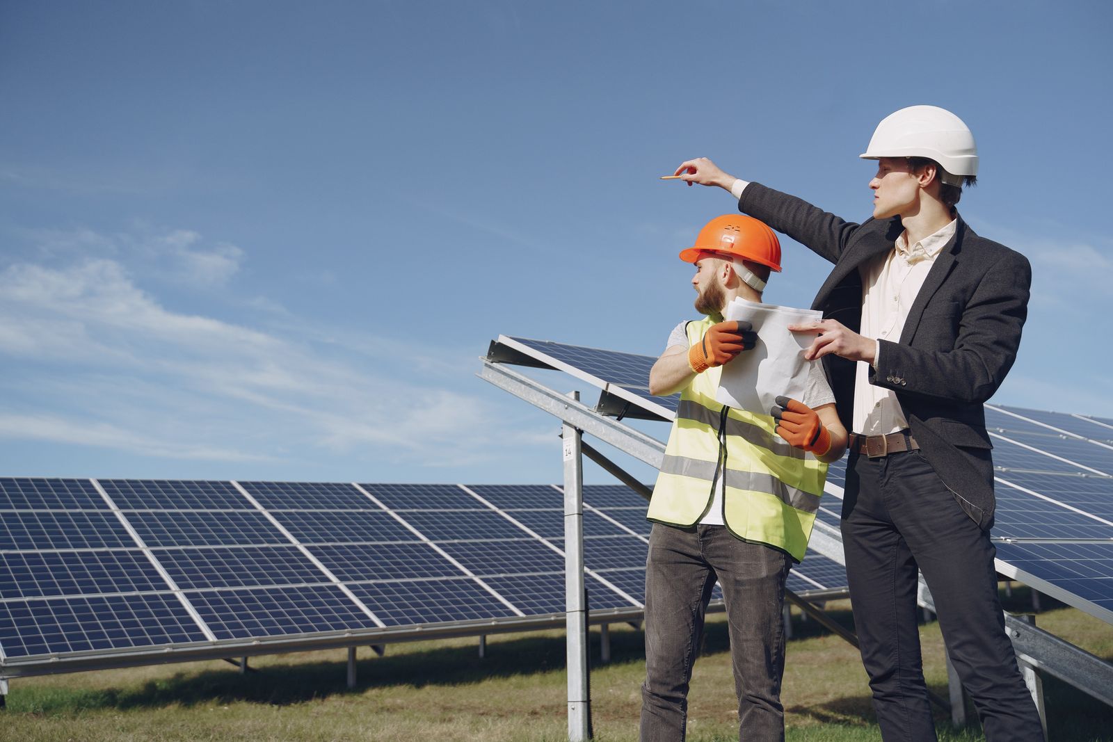 Engineer inspecting a rooftop solar array